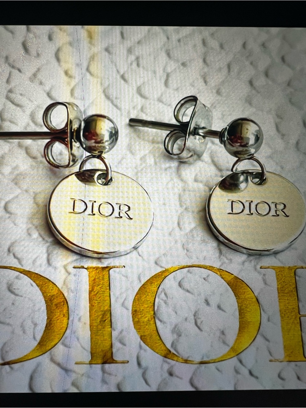 Small unbranded  Silver Logo Disc Drop Stud Earrings